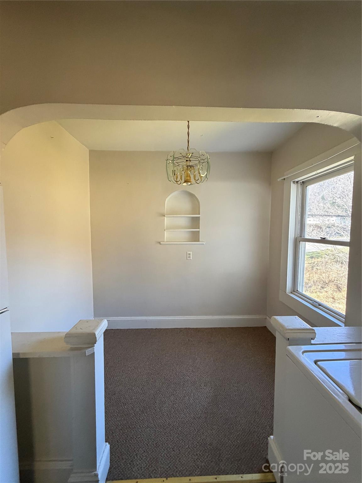 202 Snow Hill Road Bakersville, NC 28705 - Photo 16 of 27 a view of an empty room with a window