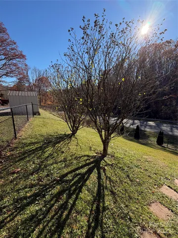 a view of swimming pool with an outdoor space and seating area
