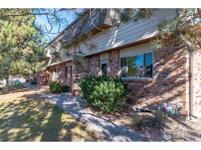 a view of a house with a street