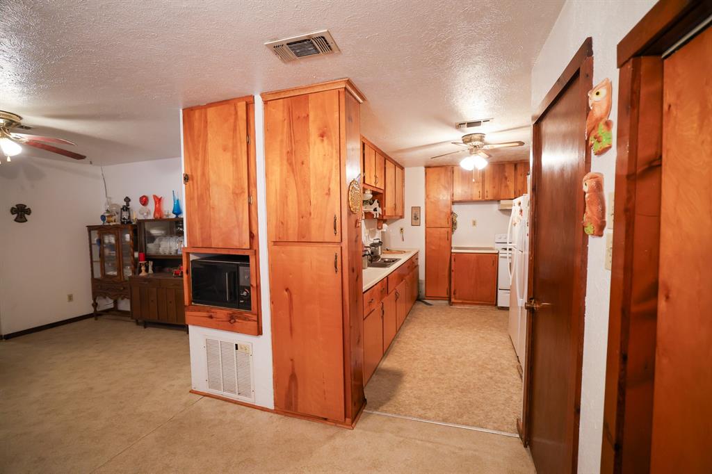 6482 County Road 4700 Commerce, TX 75428 - Photo 15 of 23 a view of a storage & utility room