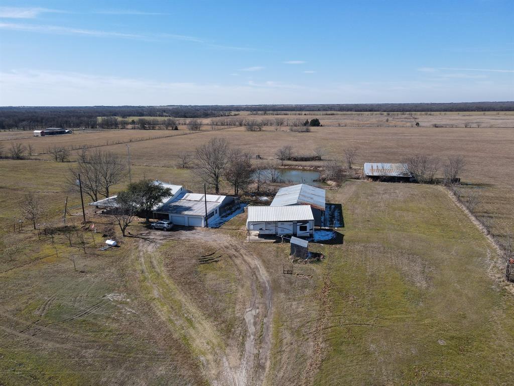6482 County Road 4700 Commerce, TX 75428 - Photo 20 of 23 a view of a terrace with sitting area