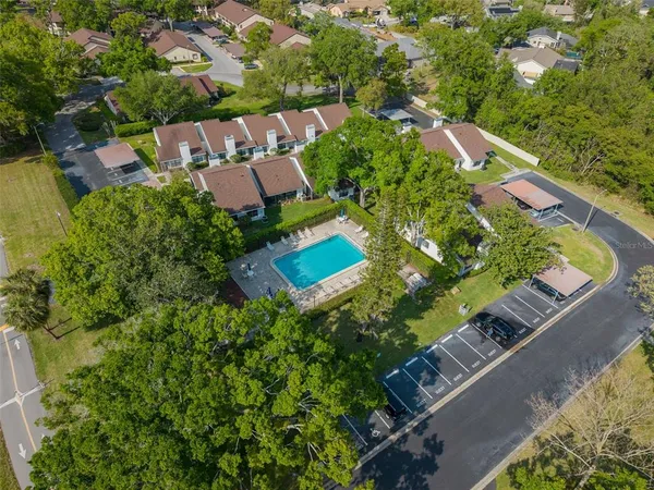 an aerial view of a house with a garden