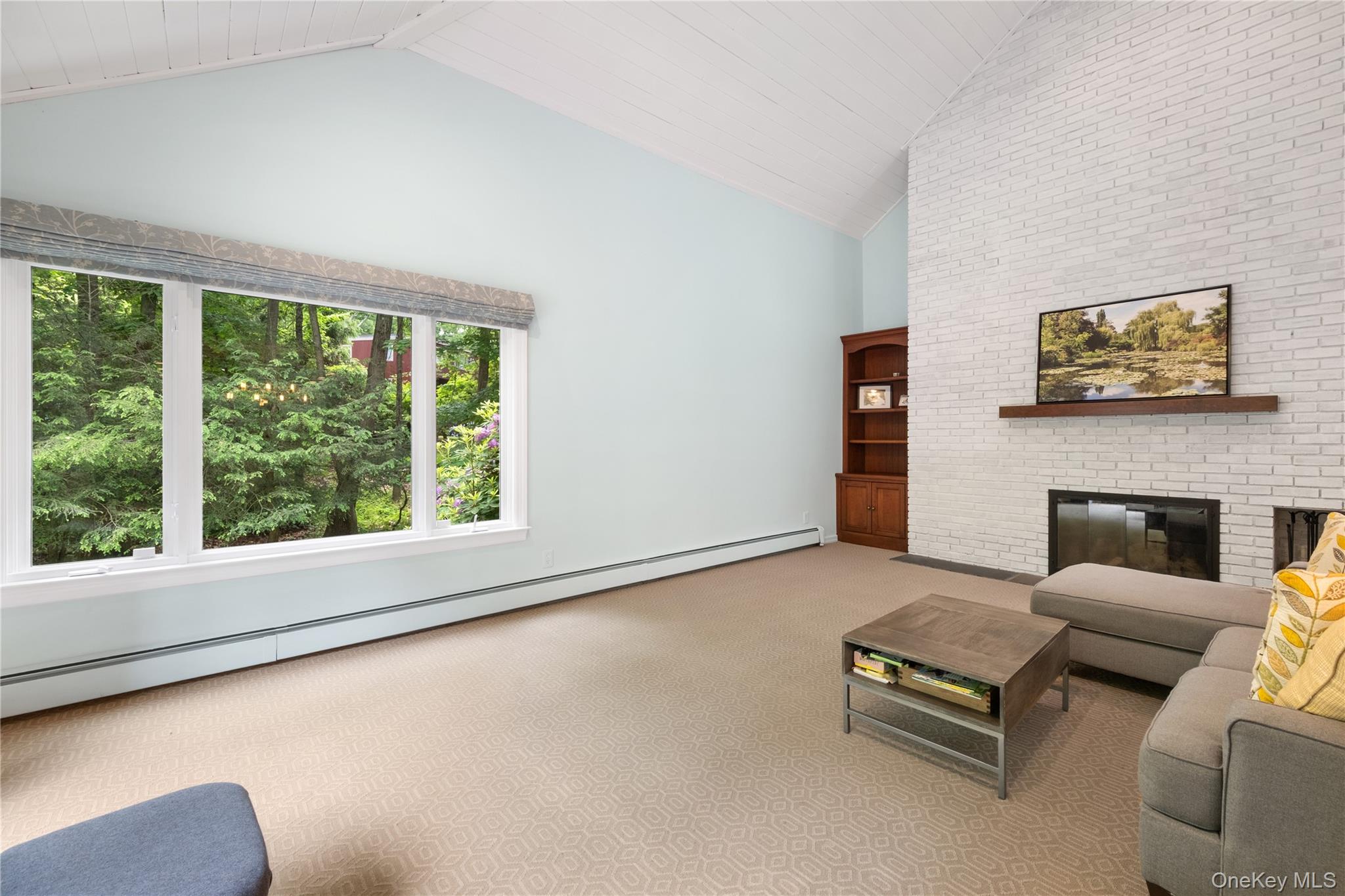 3 Breckenridge Road Chappaqua, NY 10514 - Photo 10 of 34 Other angle of family room with wall of windows