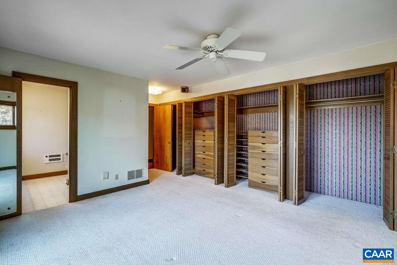 2525 Ranson Court Charlottesville, VA 22911 - Photo 17 of 31 an empty room with closet and a ceiling fan