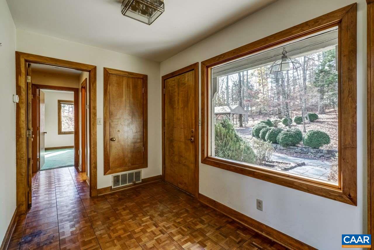 2525 Ranson Court Charlottesville, VA 22911 - Photo 19 of 31 an empty room with wooden floor and windows