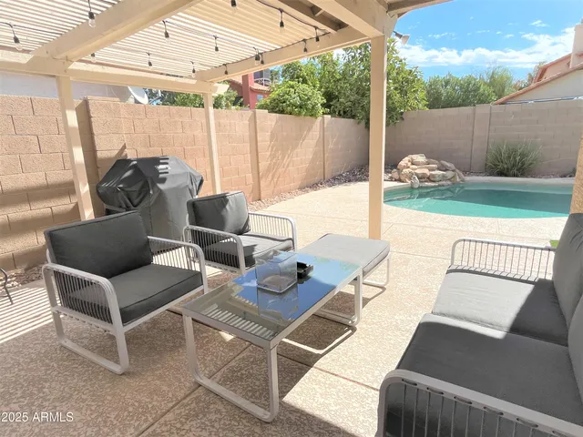 a outdoor living space with furniture