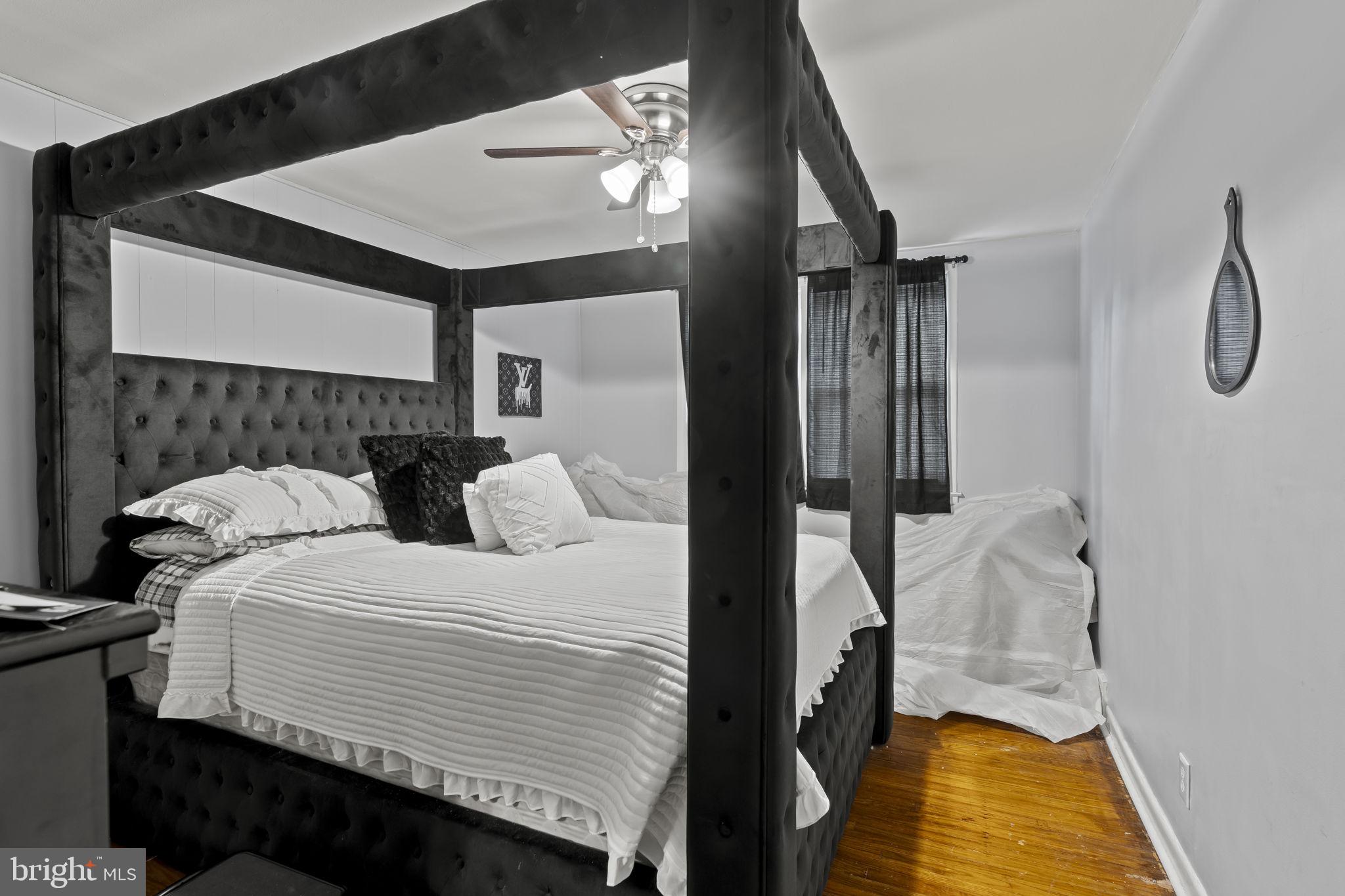 6014 Oakland Street Philadelphia, PA 19149 - Photo 5 of 13 a bedroom with bed and a window