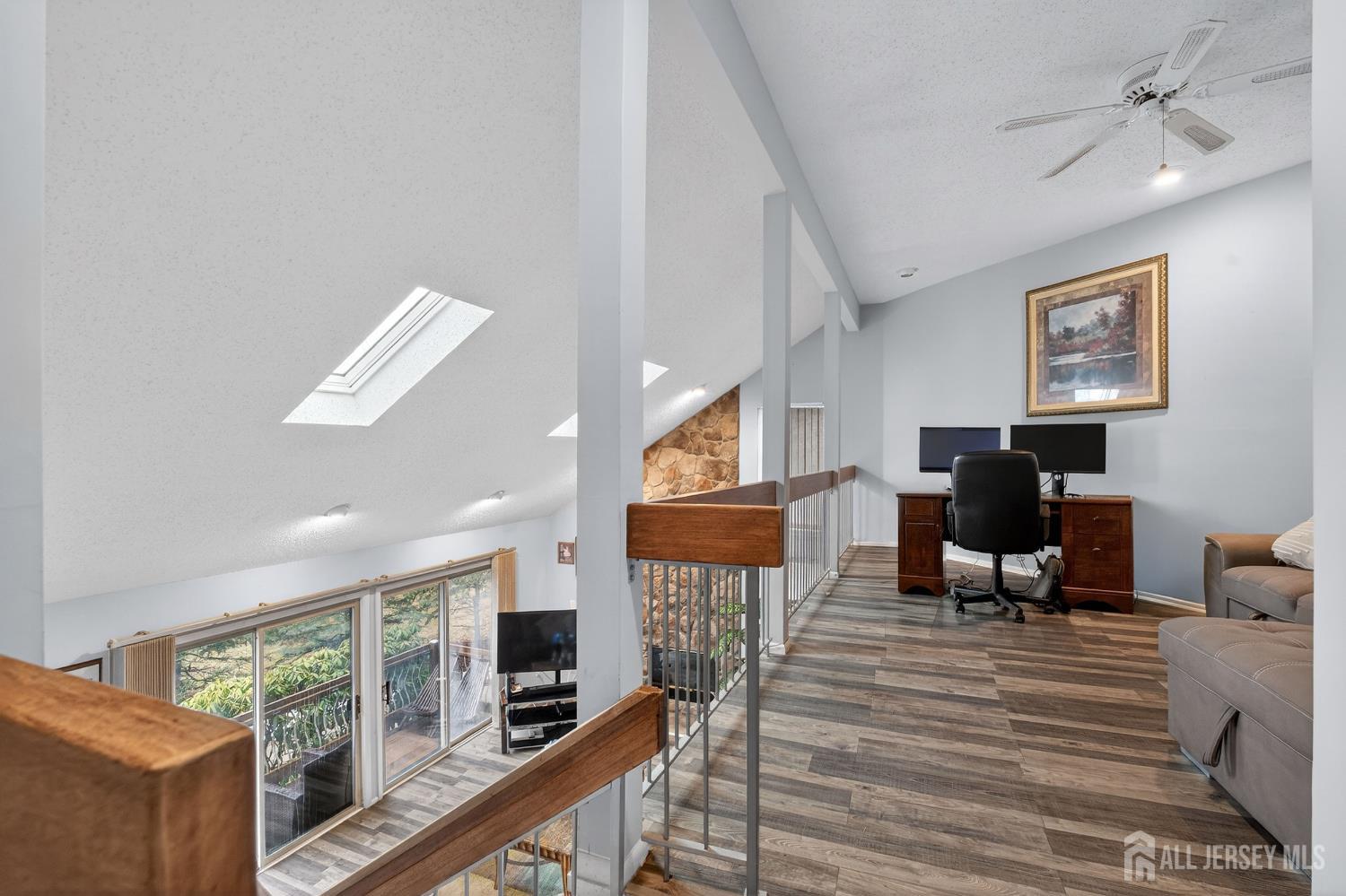 99 Kelly Drive Edison, NJ 08820 - Photo 11 of 29 a living room with furniture and a flat screen tv