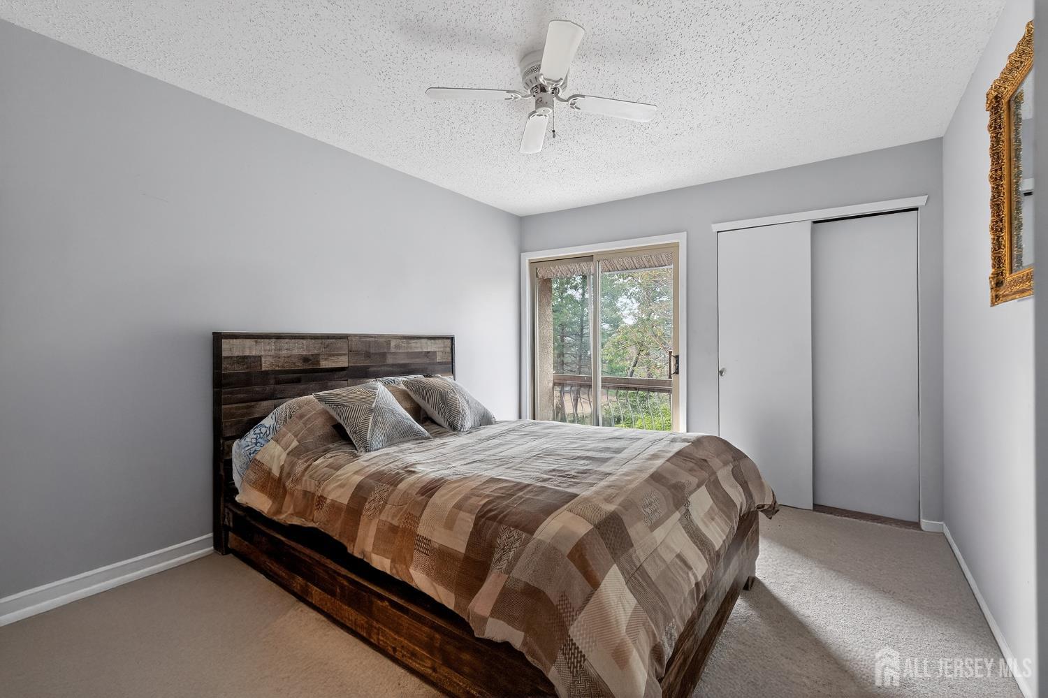 99 Kelly Drive Edison, NJ 08820 - Photo 16 of 29 a bed sitting in a bedroom next to a window