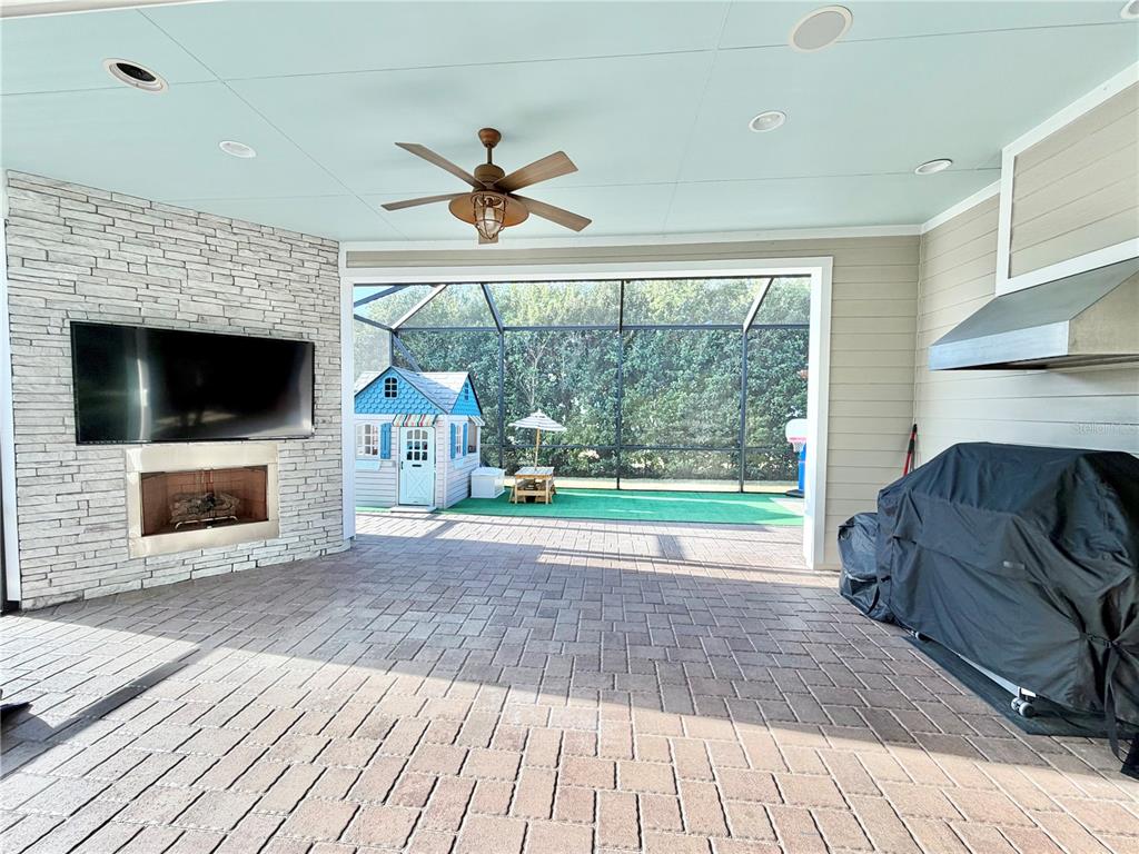 11931 Southwest 32nd Lane Gainesville, FL 32608 - Photo 43 of 78 a living room with a couch and a fireplace