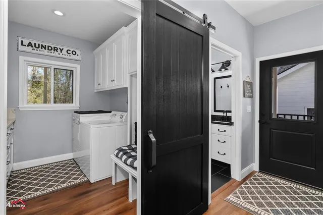 a bed room with furniture and a chandelier