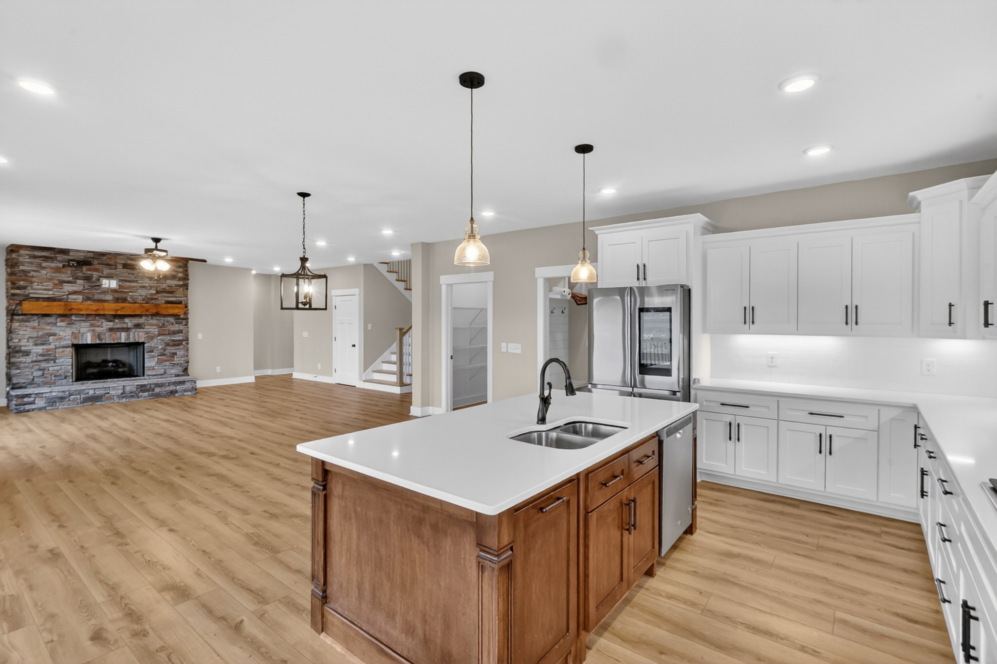 746 North Russell Street Portland, TN 37148 - Photo 13 of 45 a kitchen with a sink stove and wooden floor