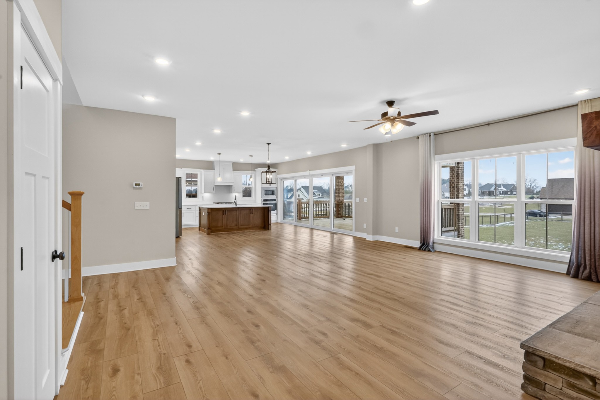 746 North Russell Street Portland, TN 37148 - Photo 18 of 45 a view of an empty room with wooden floor and a window