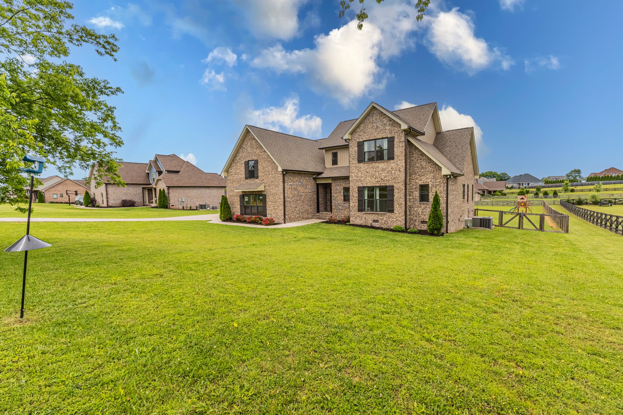746 North Russell Street Portland, TN 37148 - Photo 2 of 45 a front view of a house with a big yard