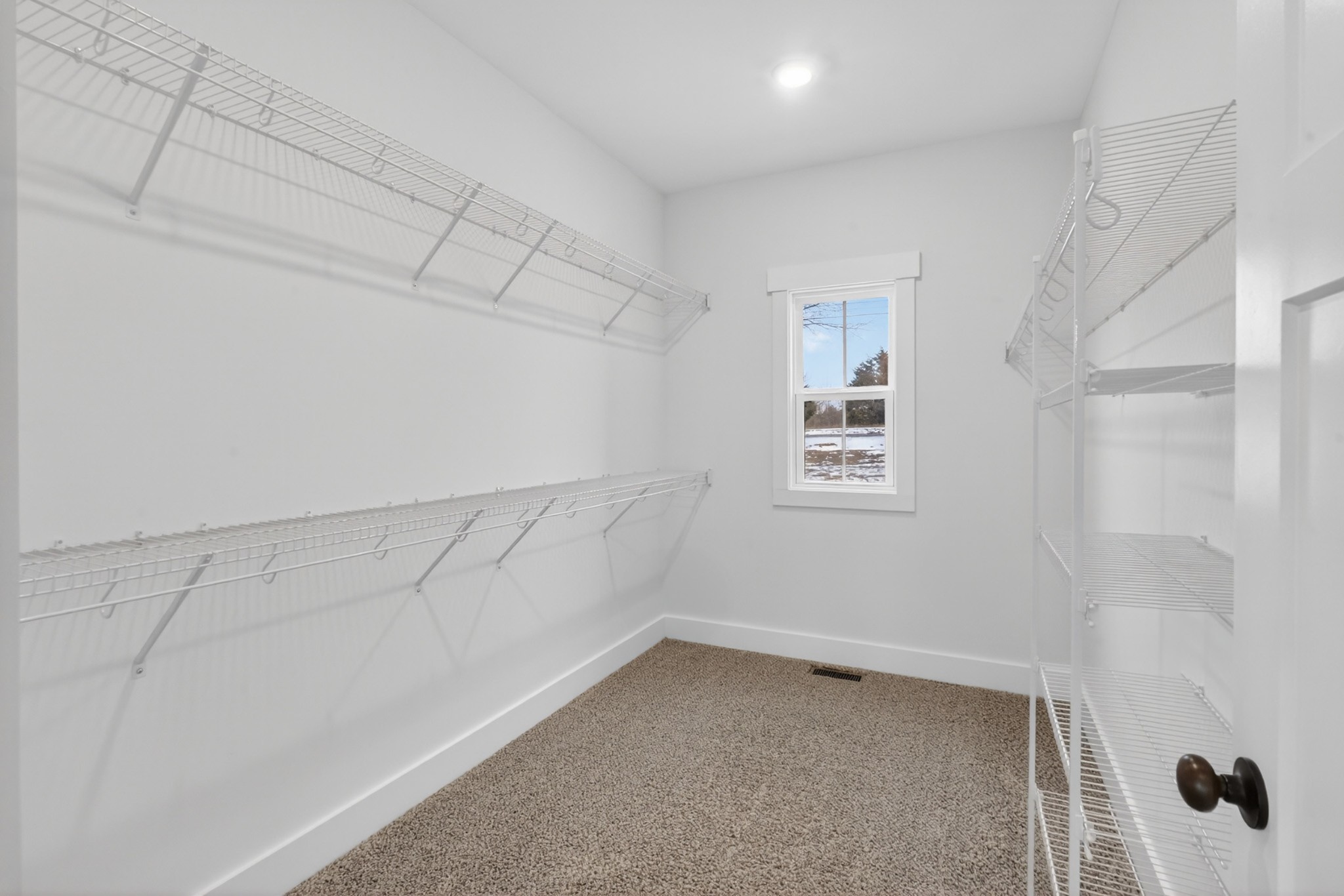 746 North Russell Street Portland, TN 37148 - Photo 23 of 45 a view of a room with racks on the wall