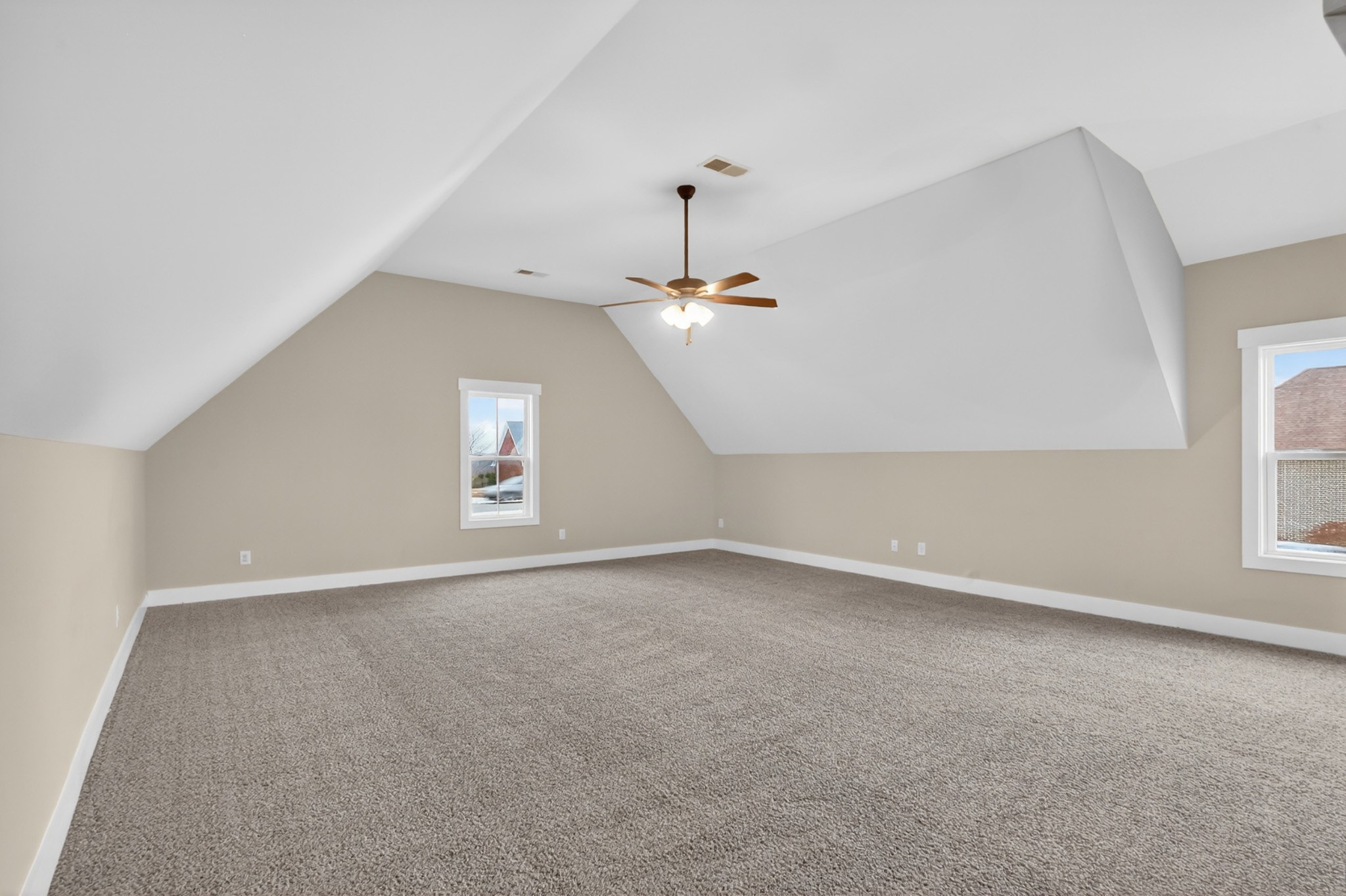 746 North Russell Street Portland, TN 37148 - Photo 31 of 45 an empty room with windows and fan