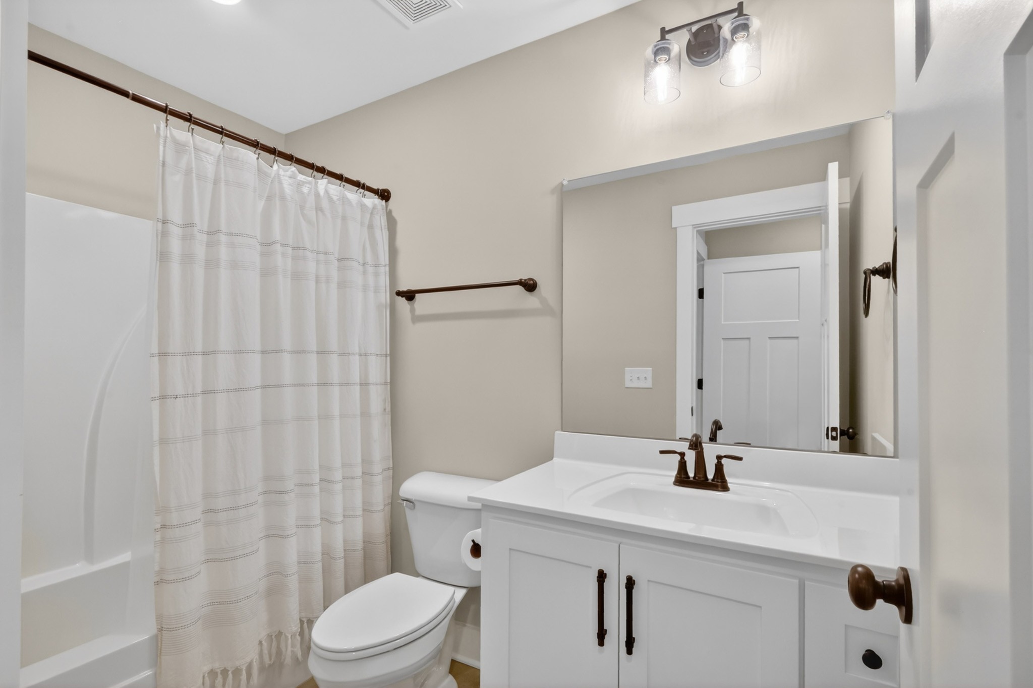 746 North Russell Street Portland, TN 37148 - Photo 35 of 45 a bathroom with a sink a toilet and shower