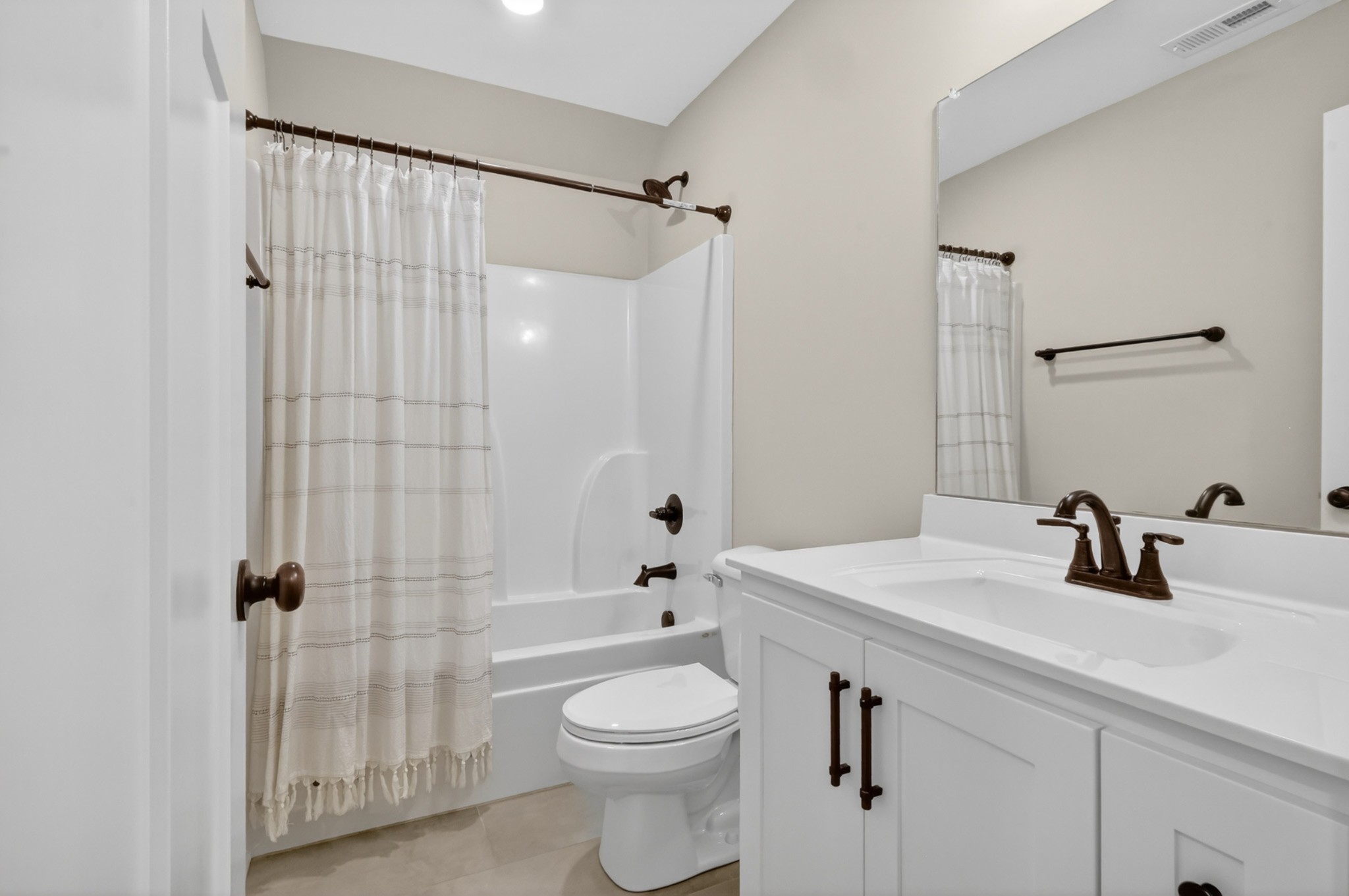 746 North Russell Street Portland, TN 37148 - Photo 38 of 45 a bathroom with a sink a toilet and shower