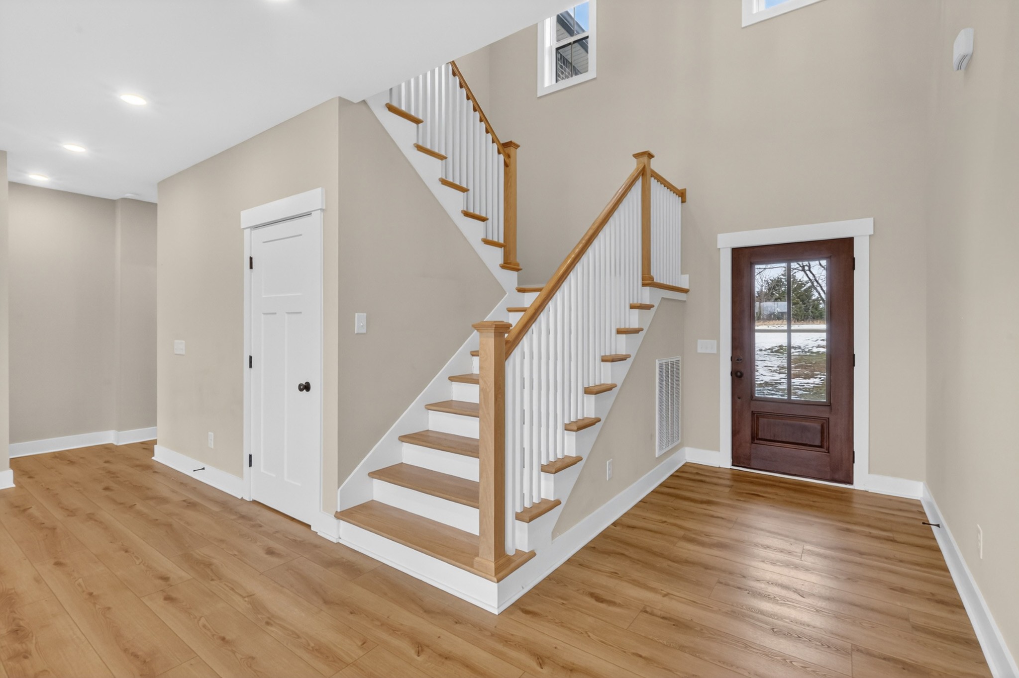746 North Russell Street Portland, TN 37148 - Photo 8 of 45 a view of entryway with wooden floor and stairs