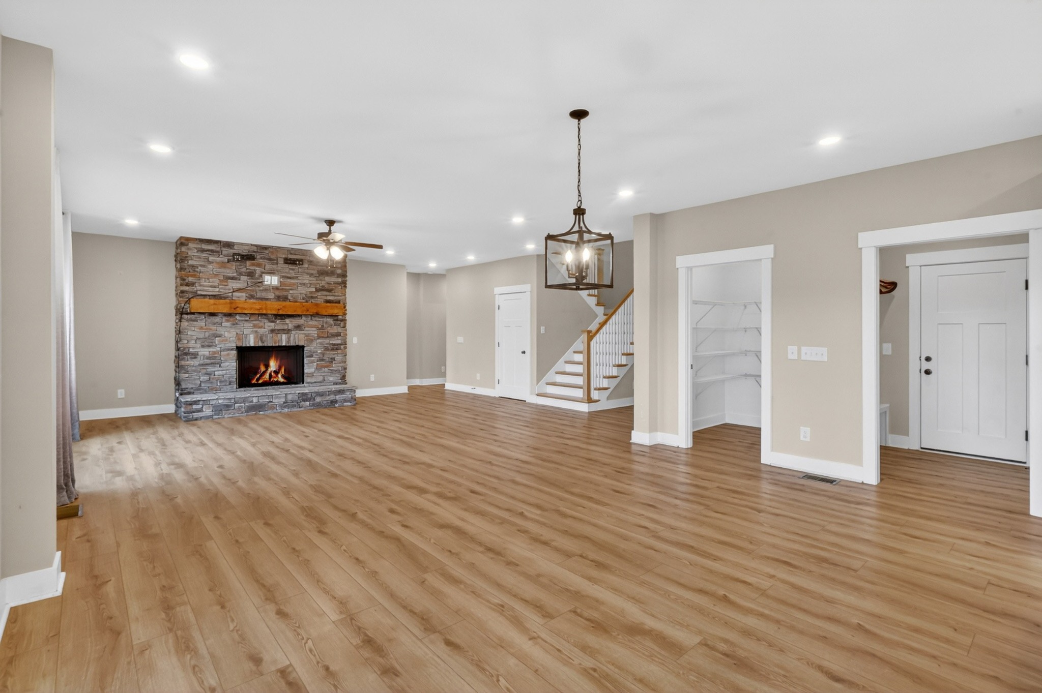 746 North Russell Street Portland, TN 37148 - Photo 10 of 45 a view of empty room with wooden floor fireplace and window