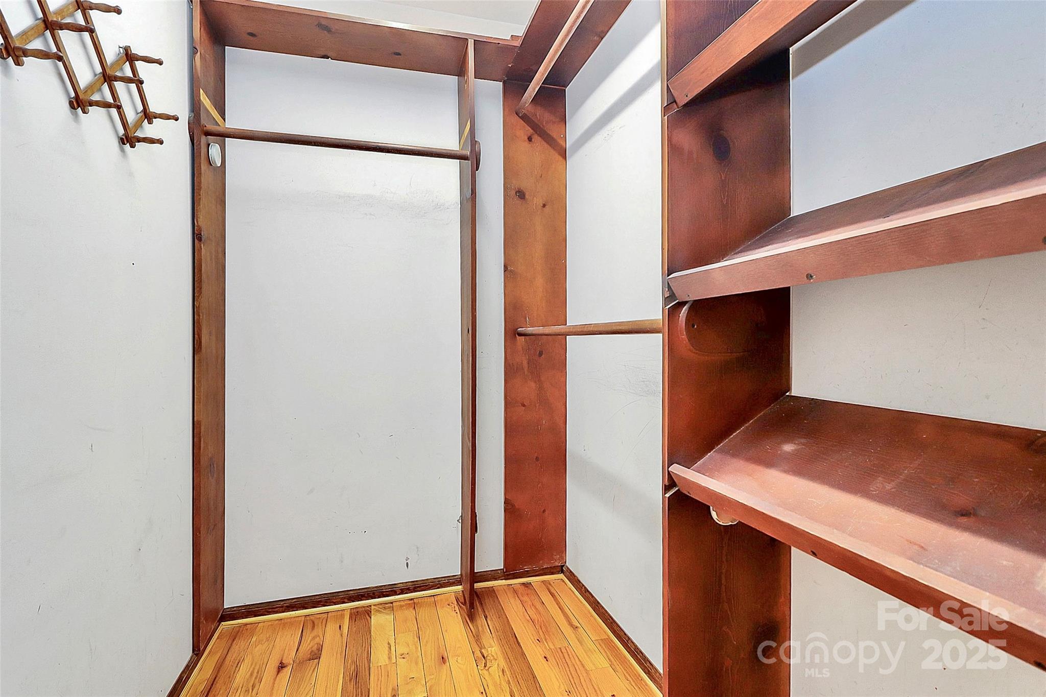 3311 Camden Road Marshville, NC 28103 - Photo 18 of 29 a view of walk in closet with empty racks