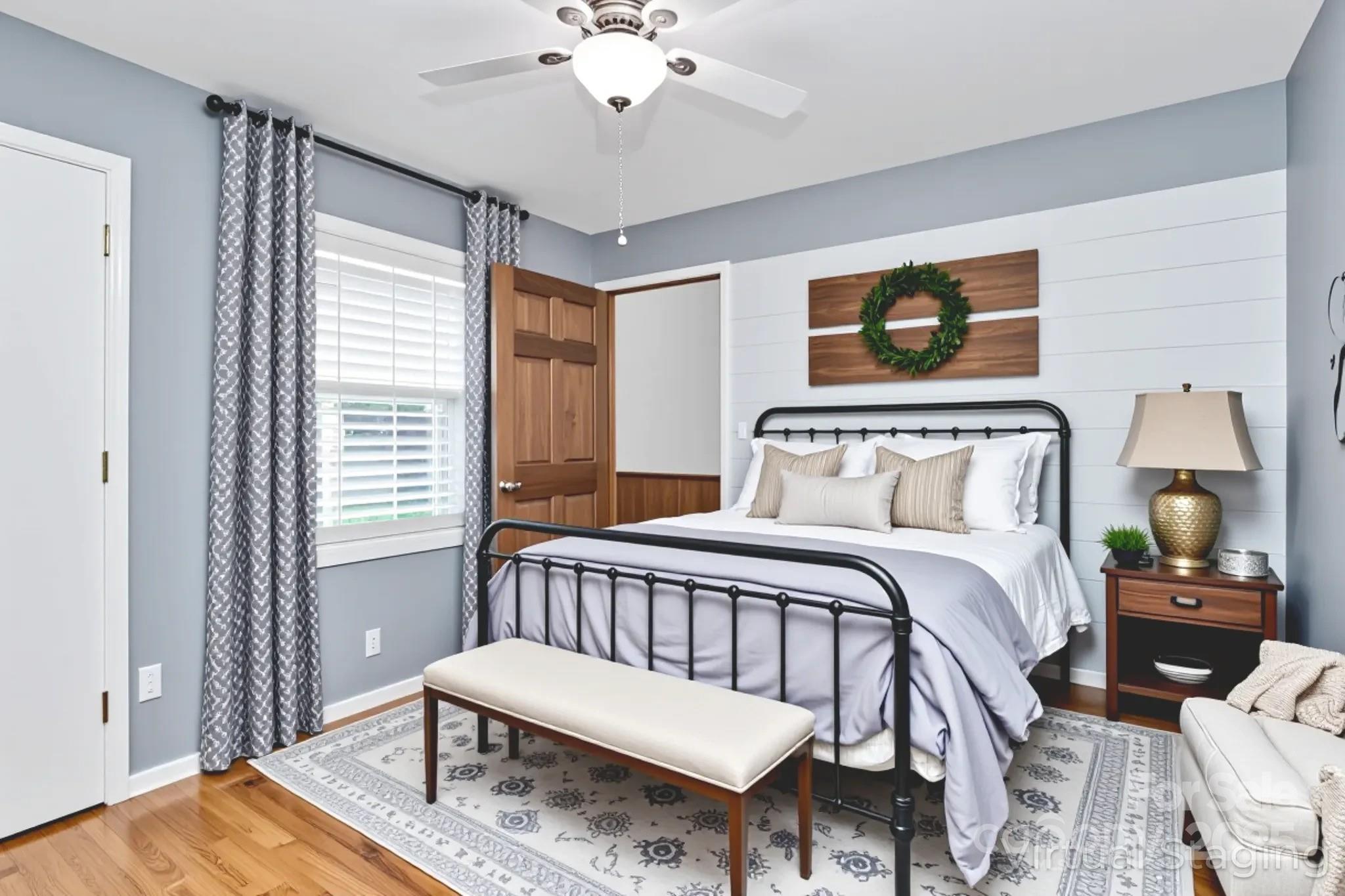 3311 Camden Road Marshville, NC 28103 - Photo 5 of 29 a bedroom with a bed and wooden floor