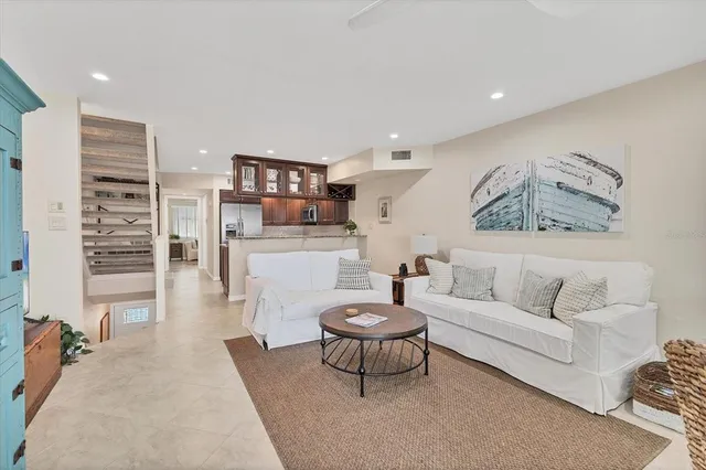 a living room with furniture and a couch