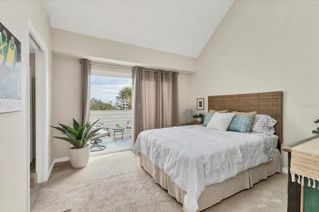 a view of a balcony with furniture