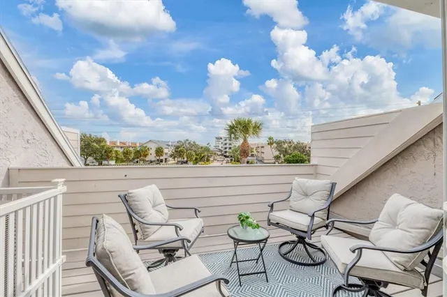a bedroom with furniture and a table