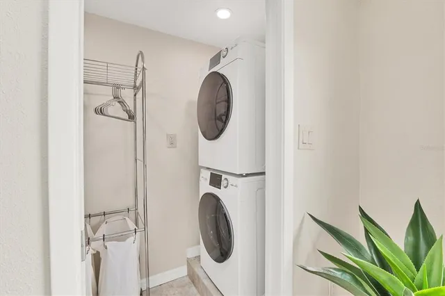 a view of a backyard with a sitting area