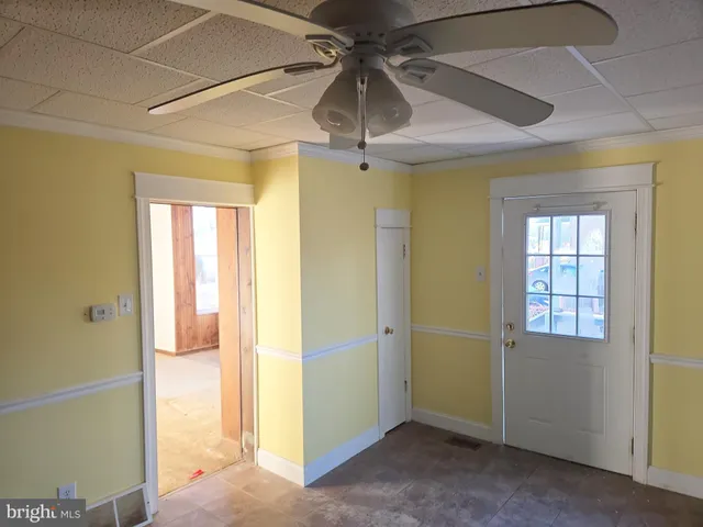 a view of front door and wooden floor
