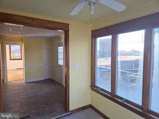 a view of entryway with a front door