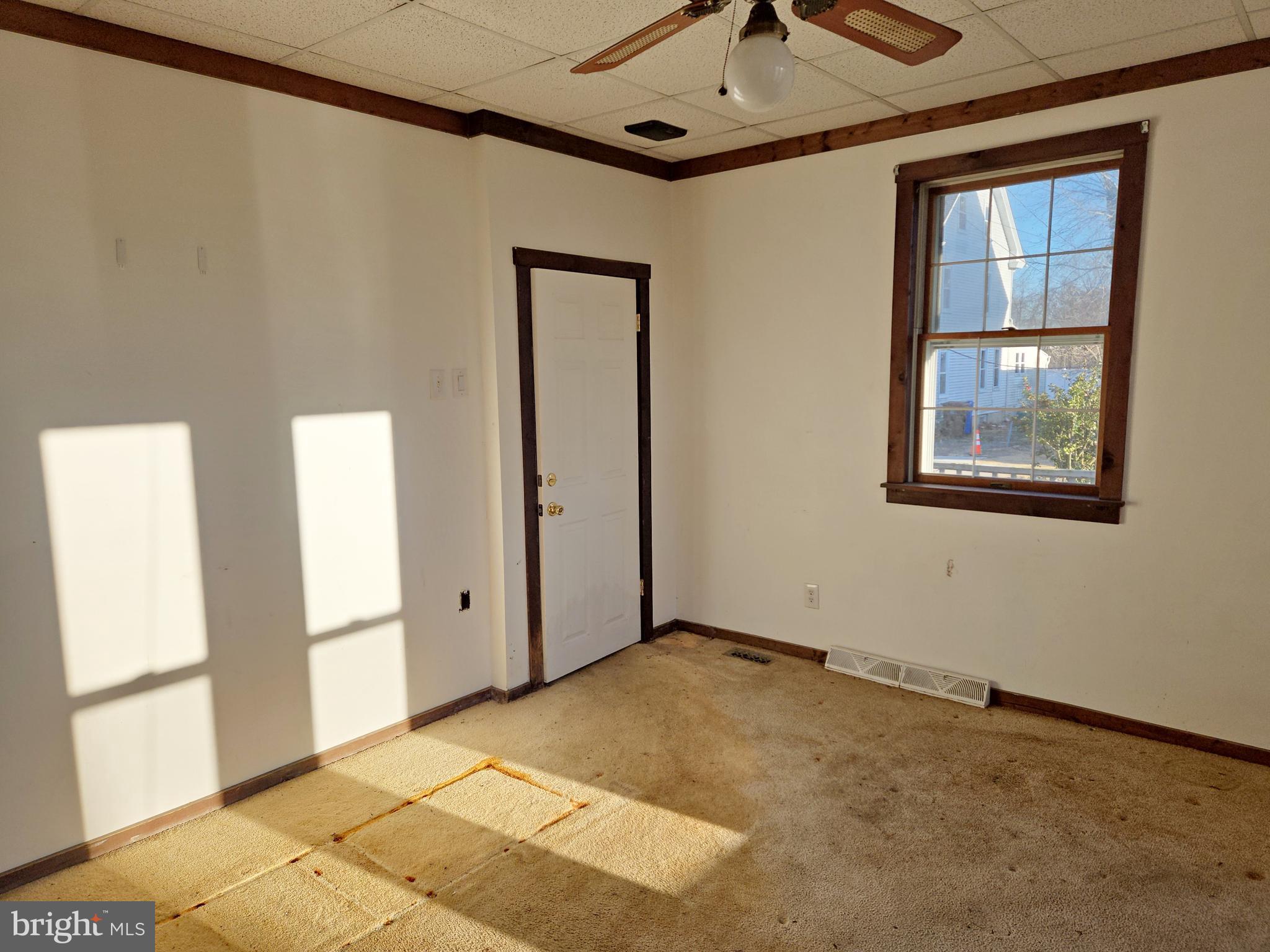 216 Broad Street Swedesboro, NJ 08085 - Photo 24 of 38 a view of an empty room with a window