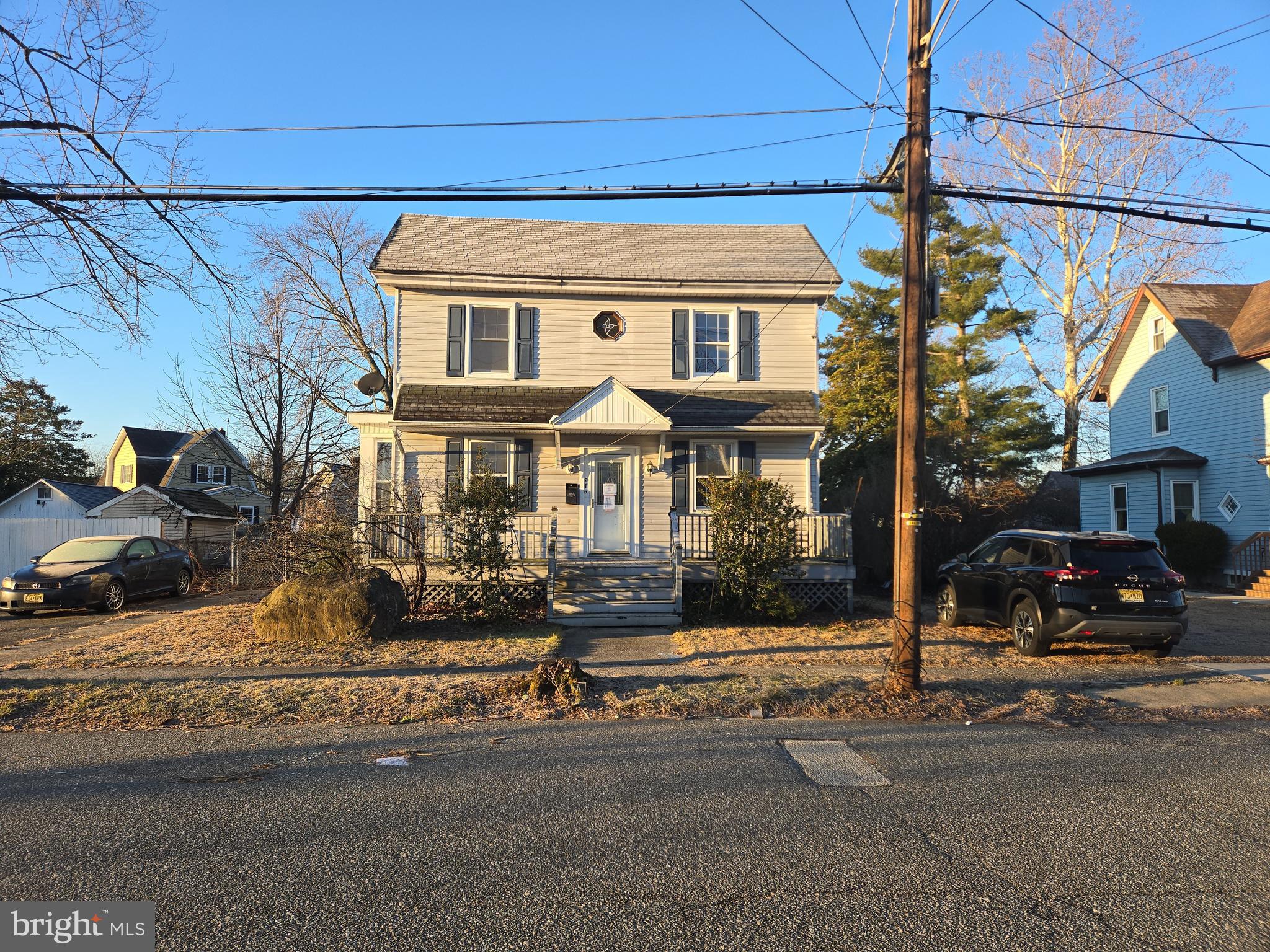 216 Broad Street Swedesboro, NJ 08085 - Photo 4 of 38 a front view of a building with street view