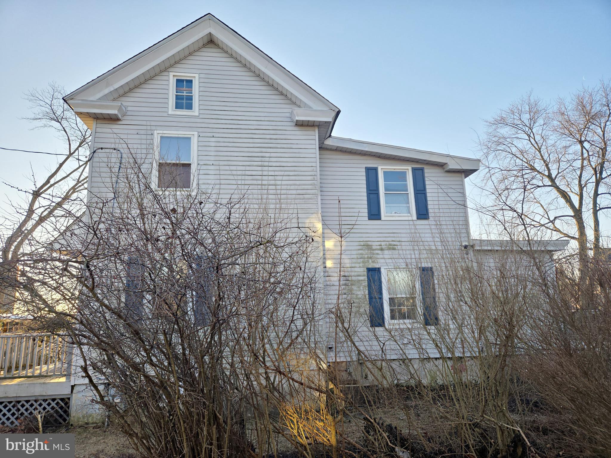 216 Broad Street Swedesboro, NJ 08085 - Photo 7 of 38 a house that has a tree in front of the house