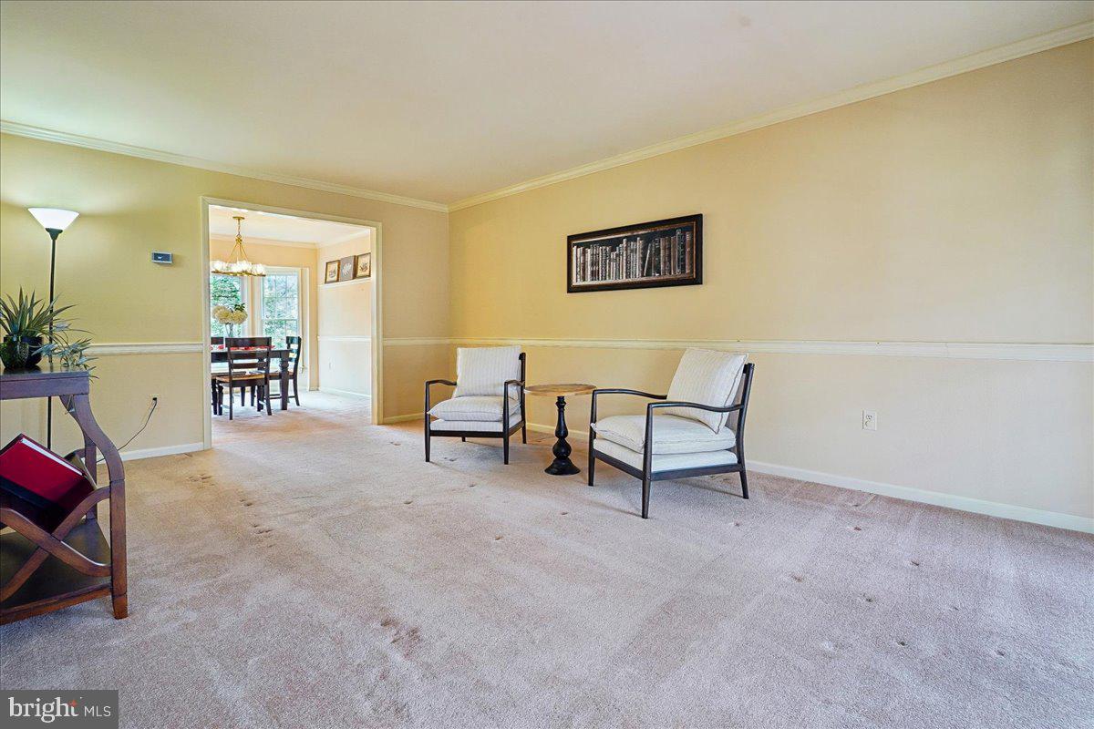 15510 Ridgecrest Drive Dumfries, VA 22025 - Photo 11 of 48 a view of a livingroom with furniture and furniture