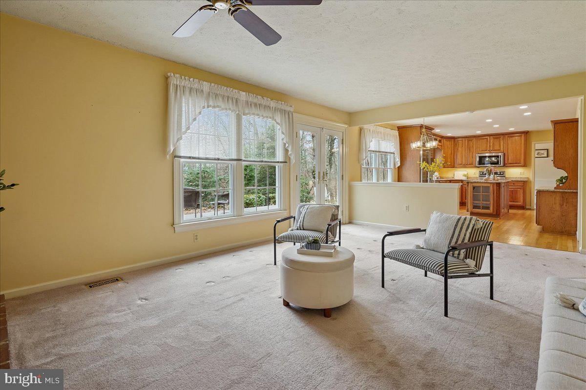 15510 Ridgecrest Drive Dumfries, VA 22025 - Photo 19 of 48 a living room with furniture and a large window