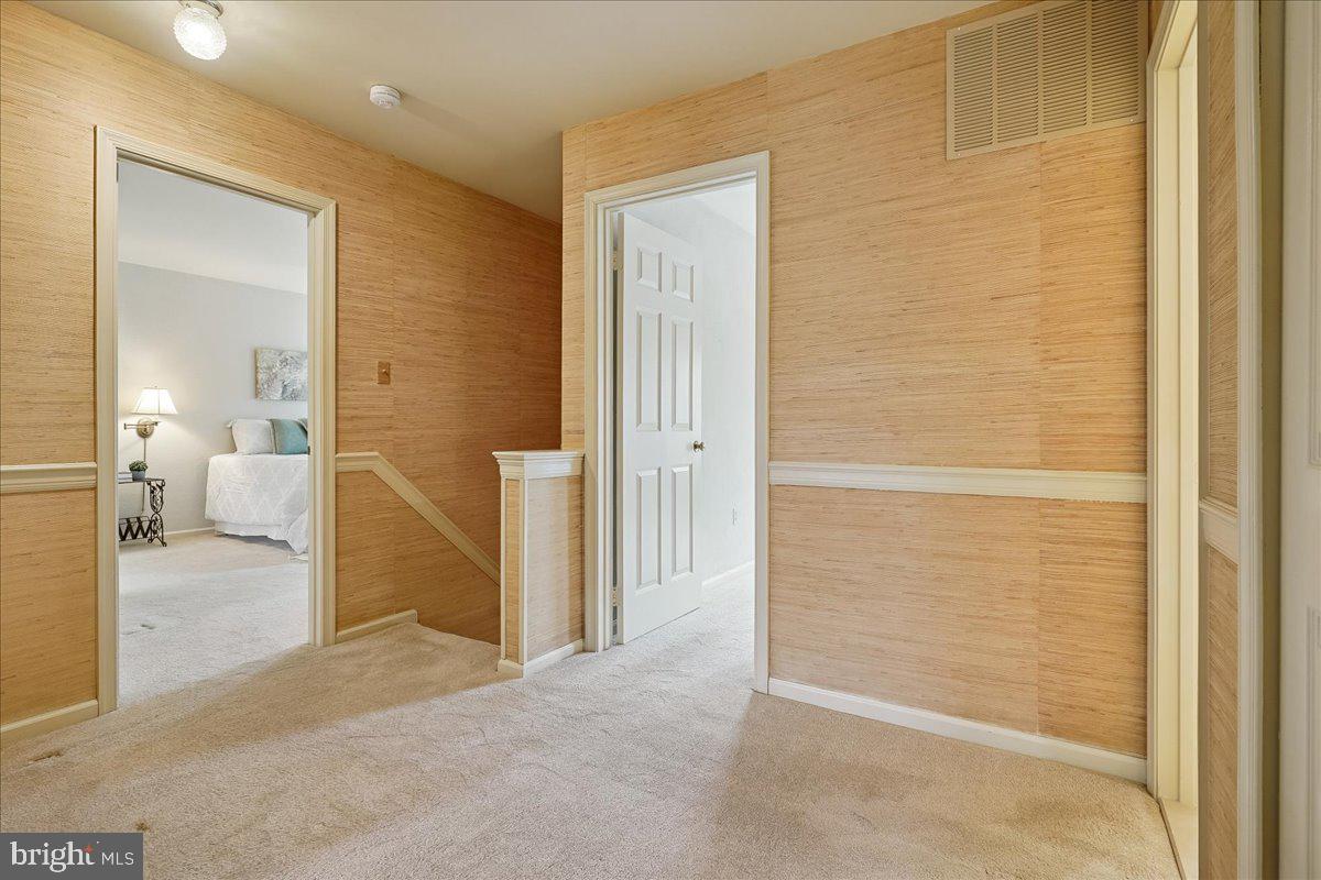 15510 Ridgecrest Drive Dumfries, VA 22025 - Photo 24 of 48 a view of a livingroom with a bathroom and sink