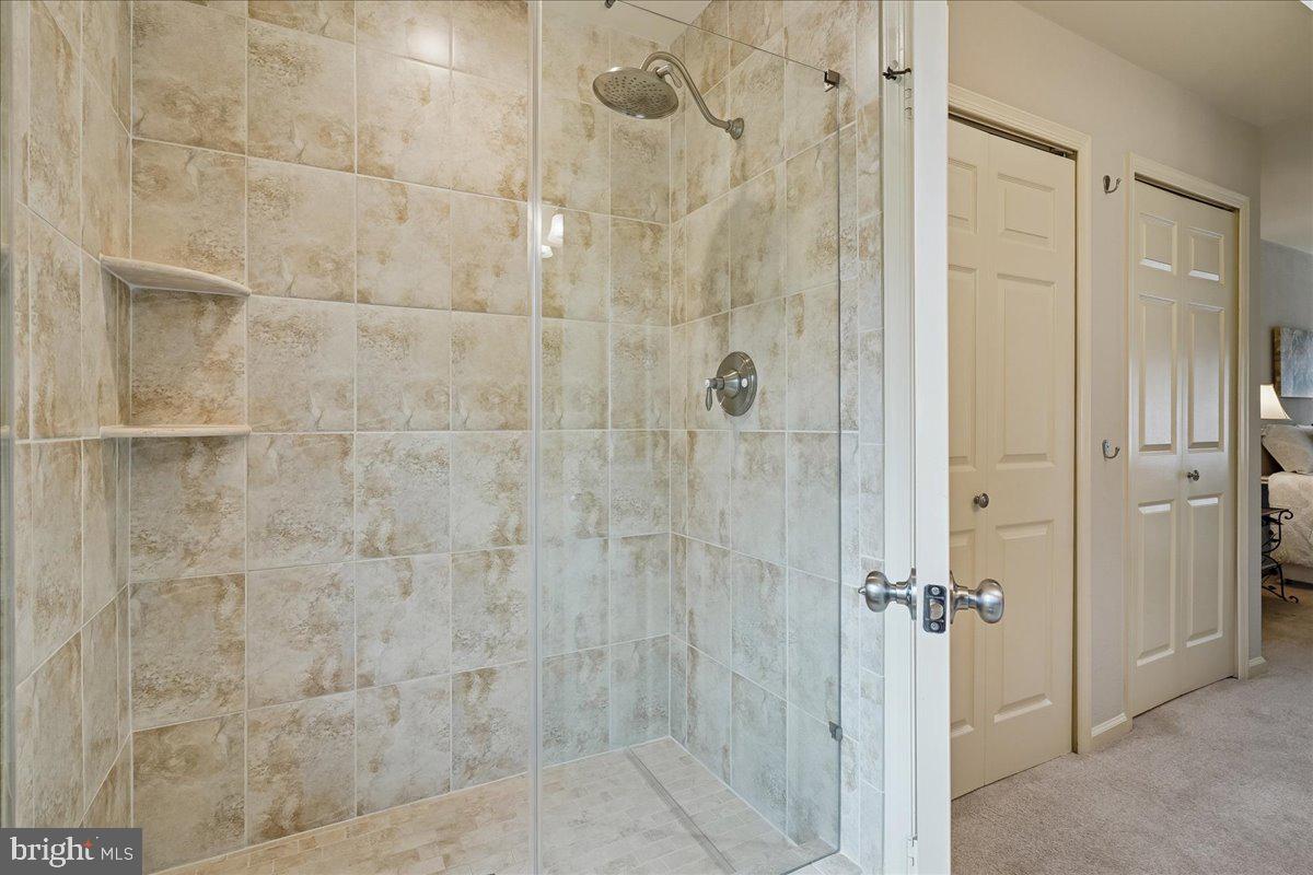 15510 Ridgecrest Drive Dumfries, VA 22025 - Photo 30 of 48 a bathroom with a shower