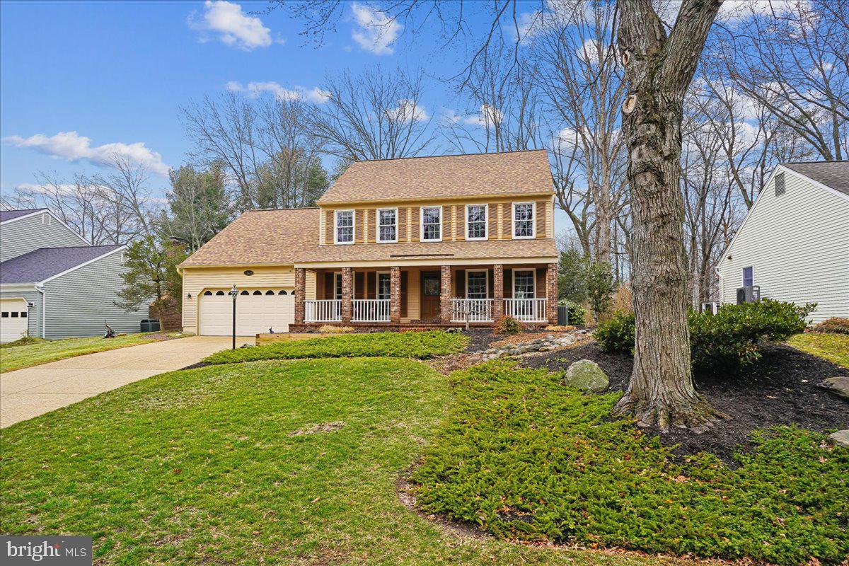 15510 Ridgecrest Drive Dumfries, VA 22025 - Photo 40 of 48 a front view of a house with garden