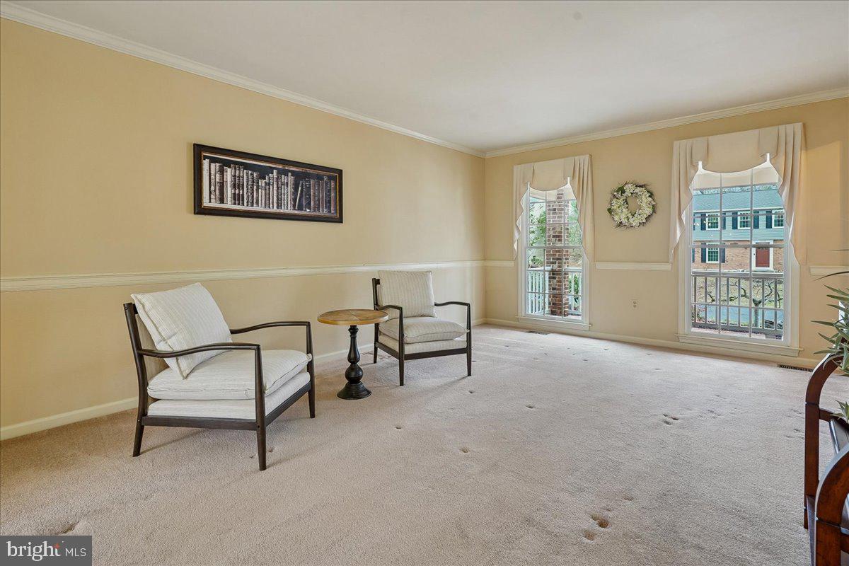 15510 Ridgecrest Drive Dumfries, VA 22025 - Photo 10 of 48 a living room with furniture and a window