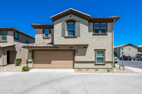 a front view of a house with entertaining space