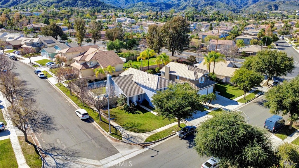 1072 Silvercreek Road Corona, CA 92882 - Photo 4 of 31 an aerial view of residential houses with outdoor space