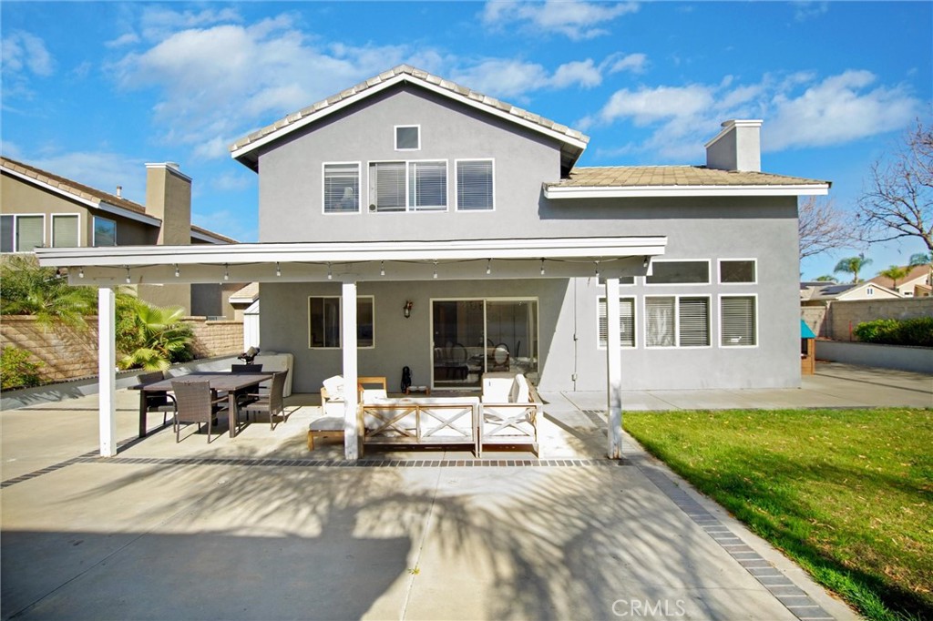 1072 Silvercreek Road Corona, CA 92882 - Photo 5 of 31 a view of a house with sitting area and swimming pool