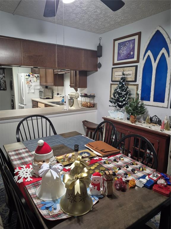 7614 Radcliffe Circle, Unit 104B Port Richey, FL 34668 - Photo 10 of 17 a bedroom with bed and furniture