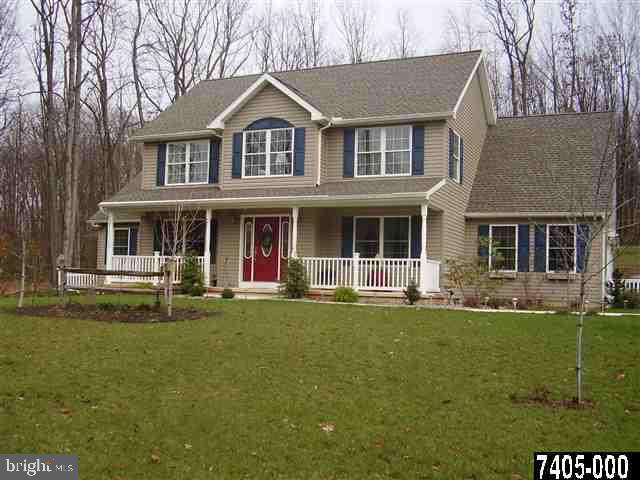 544 Rocky Ridge Road Spring Grove, PA 17362 - Photo 1 of 15 front view of a house with a yard