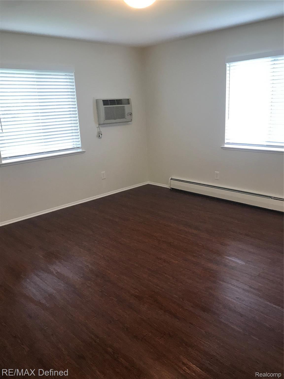 454 Romeo Road, Unit 216 Rochester, MI 48307 - Photo 6 of 10 Master Bedroom