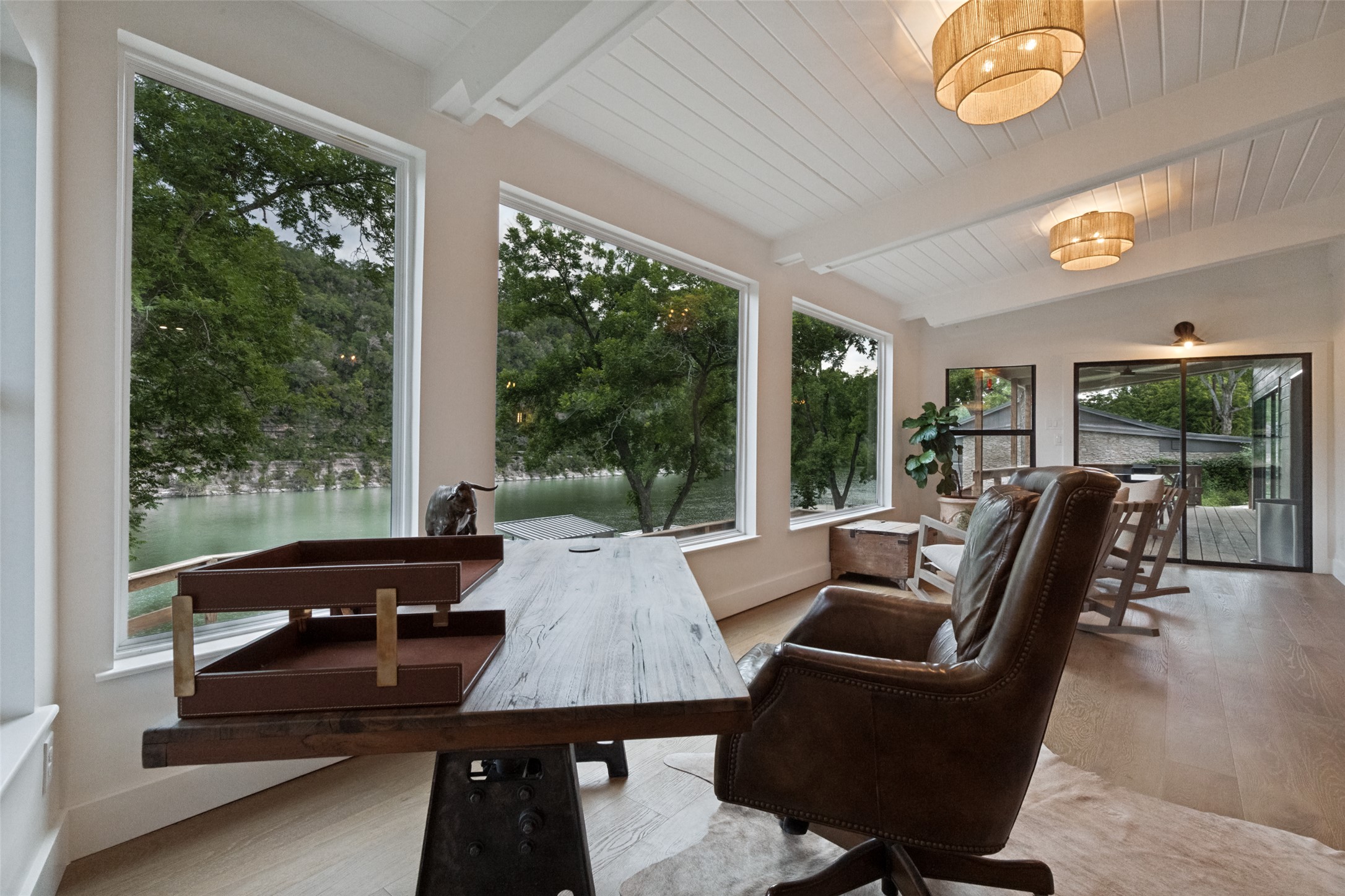 303 Lago Verde Road Austin, TX 78734 - Photo 15 of 39 A private office with expansive windows capturing breathtaking waterfront and natural views.