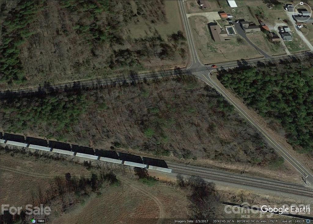 0 Kesler Road Cleveland, NC 27013 - Photo 3 of 4 a view of a yard with wooden fence