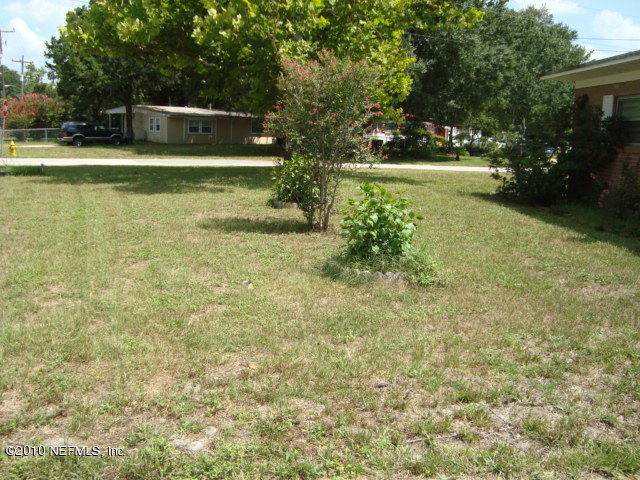 1670 Cortez Road Jacksonville, FL 32246 - Photo 3 of 12 a view of a house with a yard